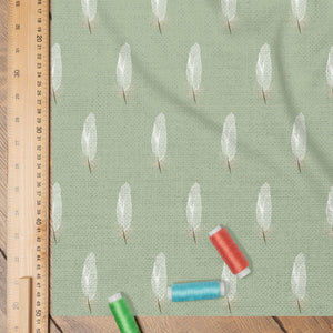 White Feathers Fabric on Sage Green Background